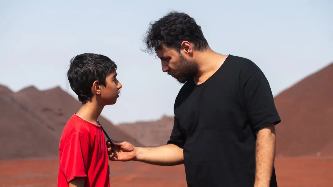 دانیال فرجی در کنار جواد عزتی